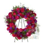 Corona de Rosas + Claveles + Statice + Atril