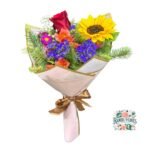 Ramo Primaveral Rosa + Girasol + flores de Temporada