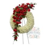 Corona de Rosas + Claveles + Gerberas Rojas + Maule + Atril