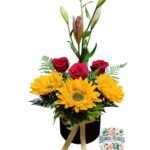 Box Cilindro Rosas + Girasoles + Lirios
